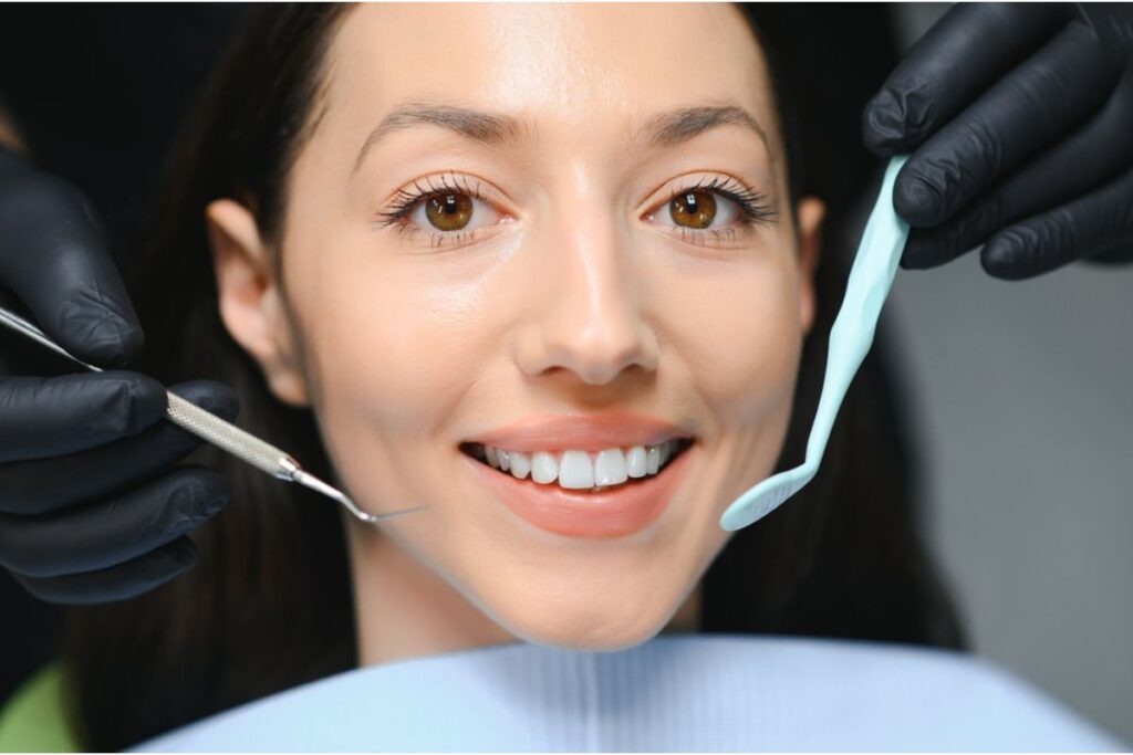 Bright white smile after professional tooth whitening treatment.