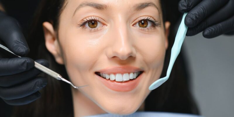 Bright white smile after professional tooth whitening treatment.