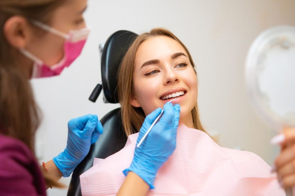 Patient smiling calmly during a dental checkup.