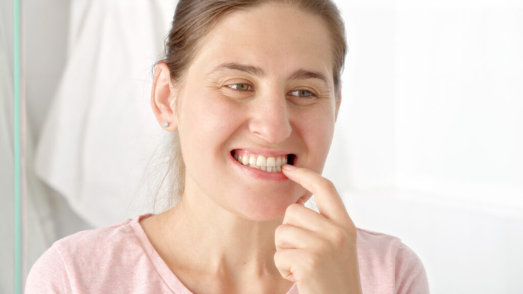 What Is the Small Black Point on My Tooth?