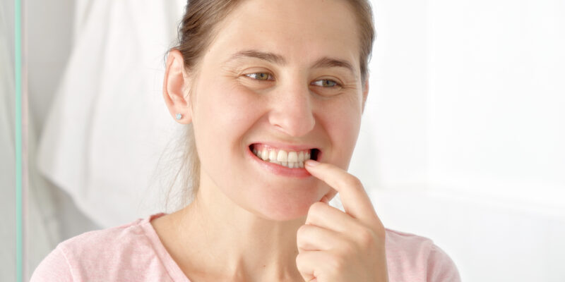 What Is the Small Black Point on My Tooth?
