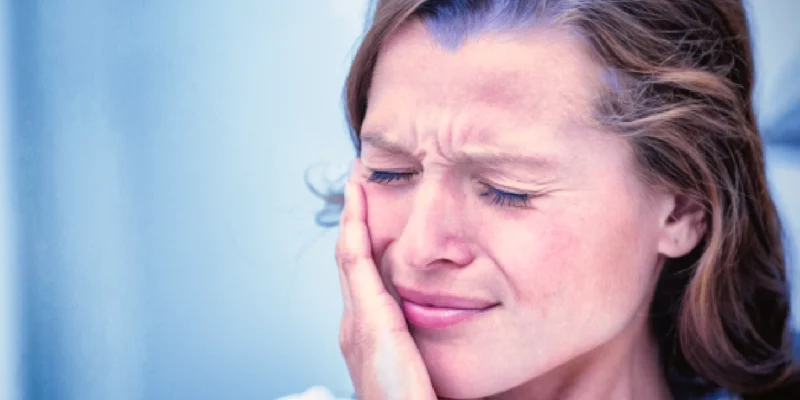 Woman having toothache